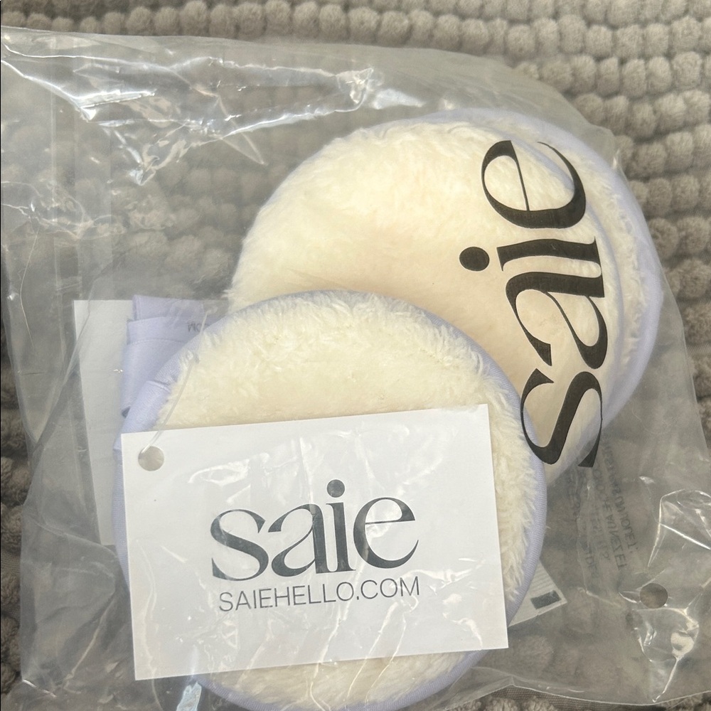 Saie Soft Cream and Light Purple Beauty Pads